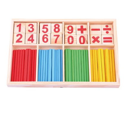 Set of wooden numbers and math symbols in a box on a white background