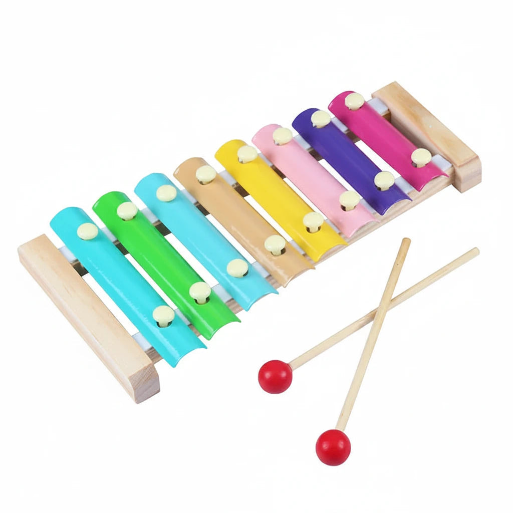 Colorful wooden xylophone with two mallets on a white background