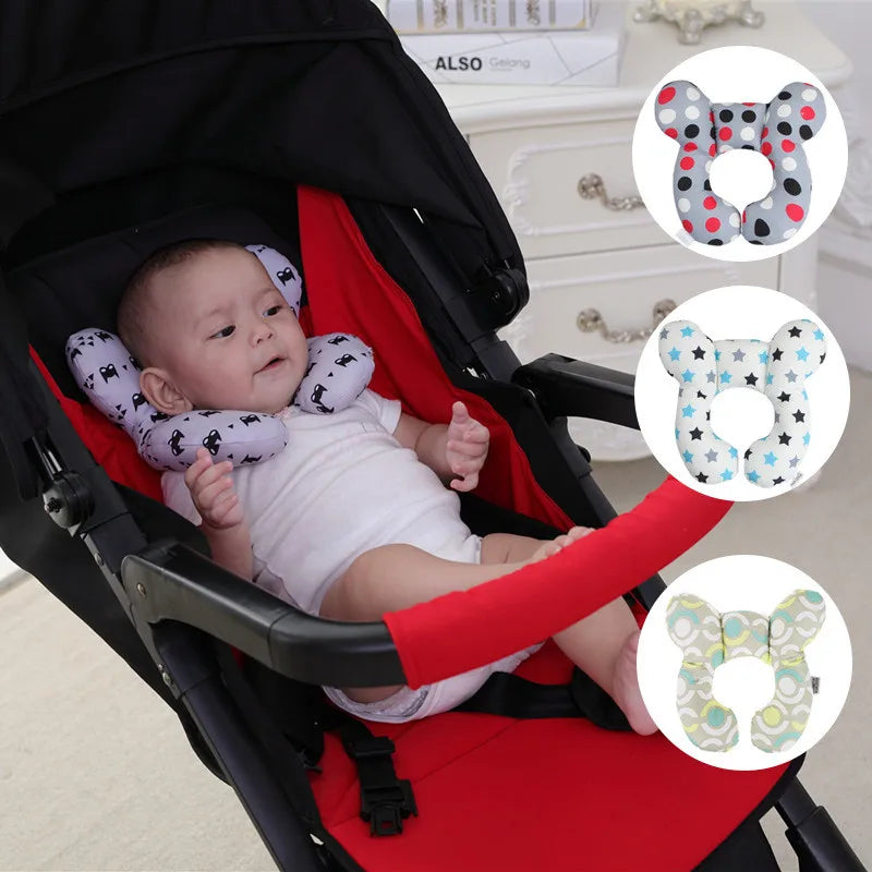 Baby in a stroller with decorative headbands displayed above