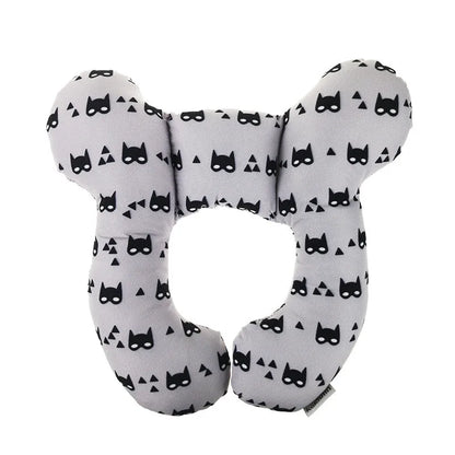 Gray neck pillow with black cat mask pattern on a white background
