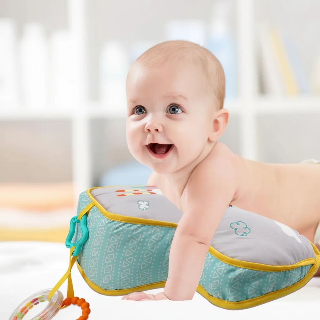 Baby using a tummy time support pillow with text about its benefits.