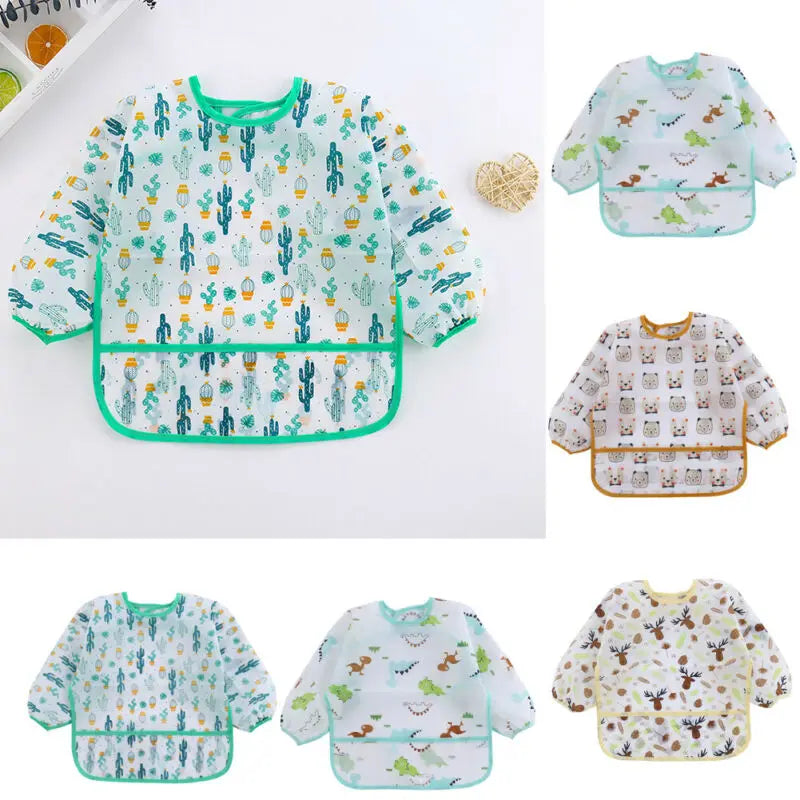 Collection of baby bibs with various patterns on a white background