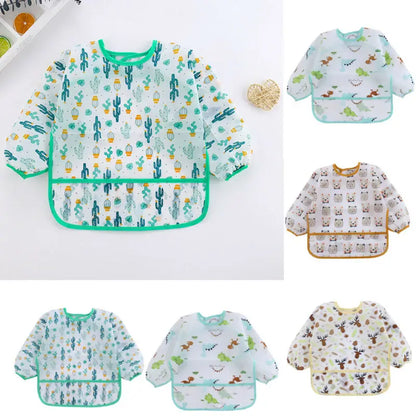 Collection of baby bibs with various patterns on a white background