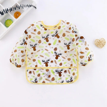 Baby bib and burp cloth set with deer pattern on a white background