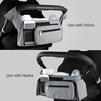 Stroller organizer with hooks and velcro attachments on a white background