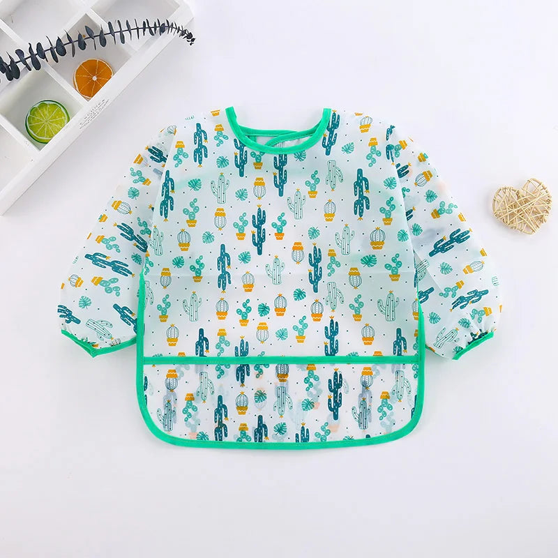 Baby bib with cactus pattern on a white background