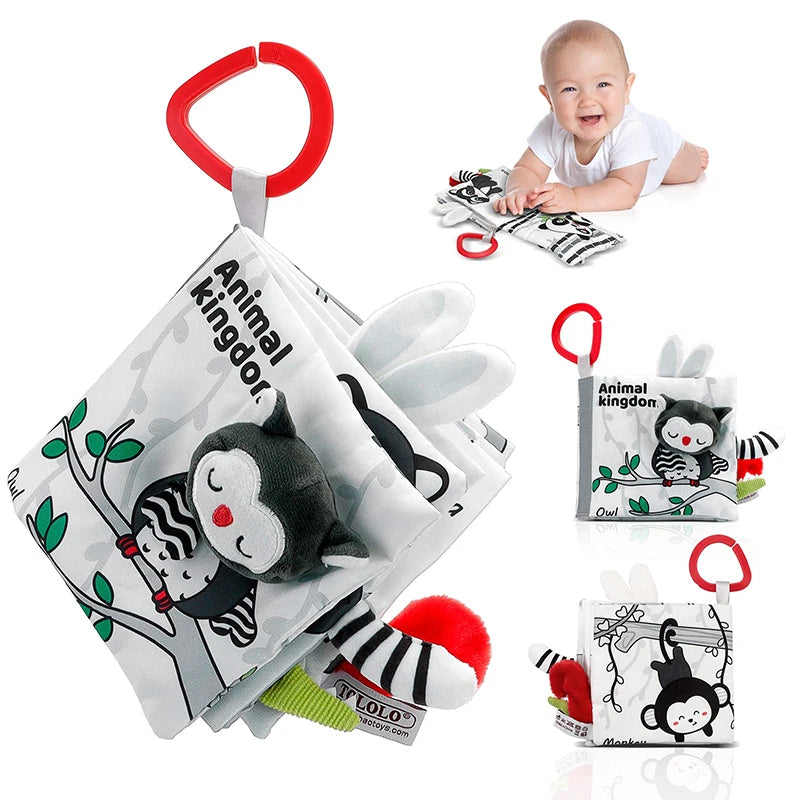 Baby toy with soft book and plush toys, featuring animals and a red handle.