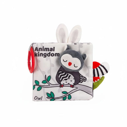 Children's soft book with owl design and measurement details on a white background