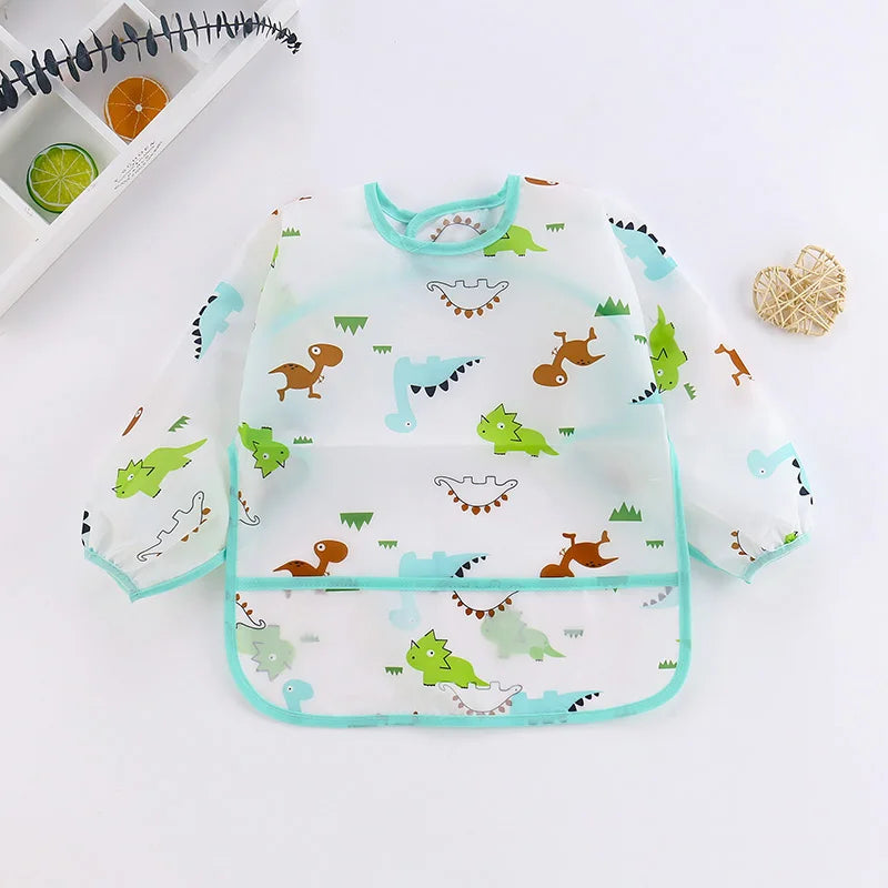 Baby bib with dinosaur pattern on a white background