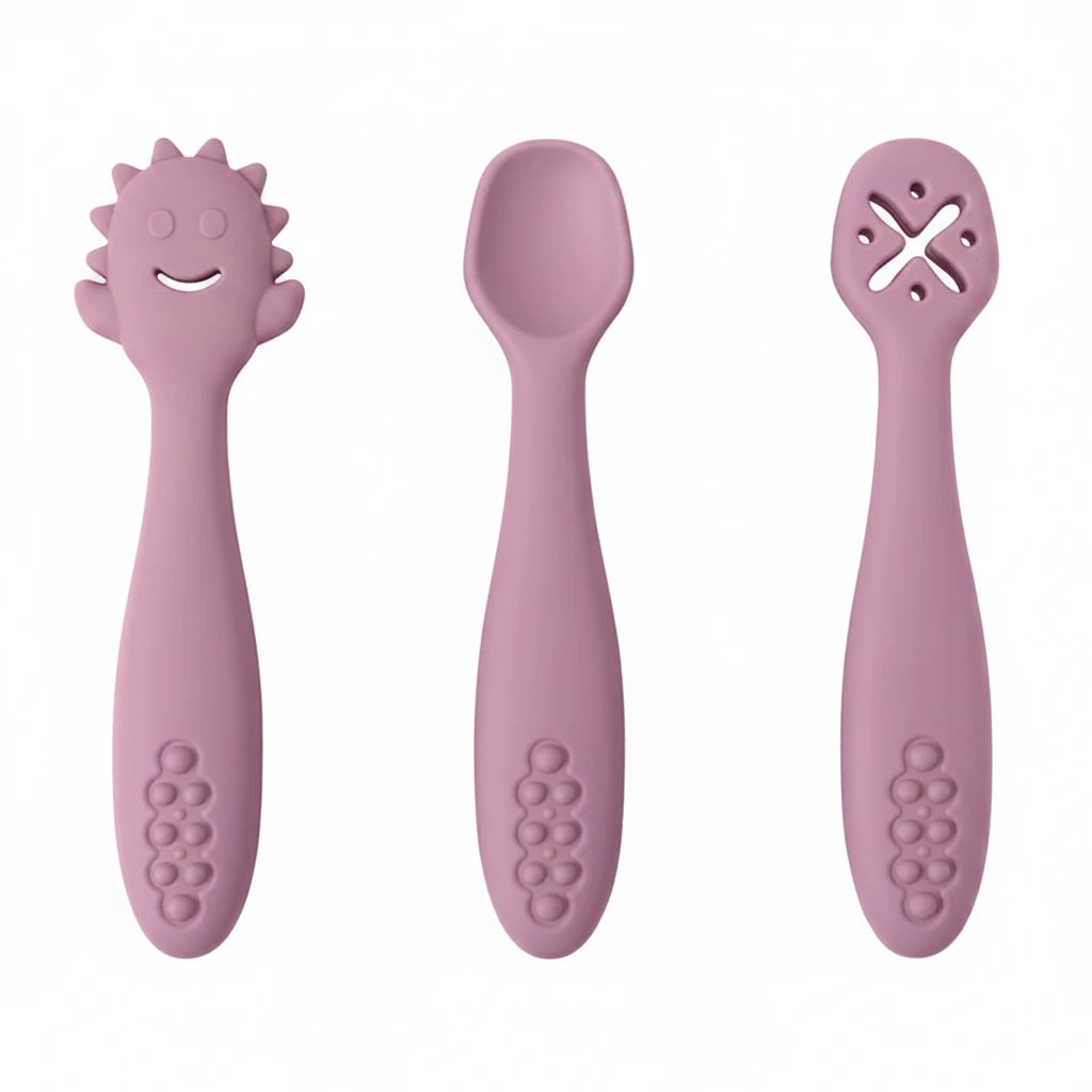 Three pink baby utensils with measurements on a white background