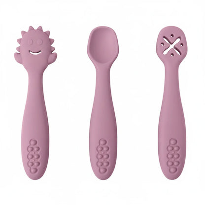 Three pink baby utensils with measurements on a white background