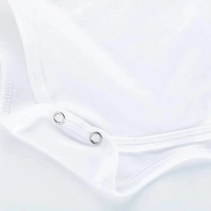 Close-up of a white garment with a zipper detail on a light gray background
