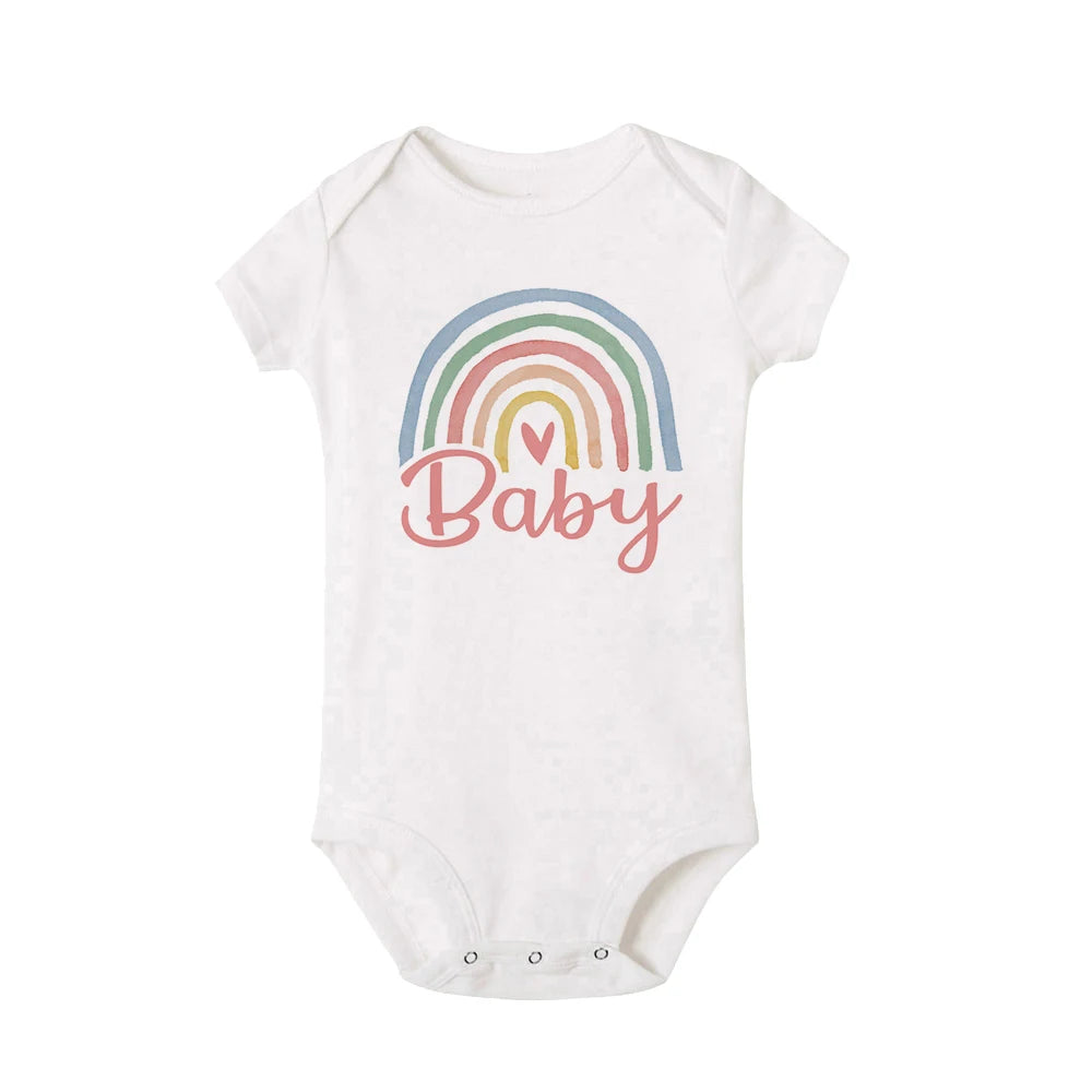 White baby onesie with a rainbow and 'Baby' text on a white background