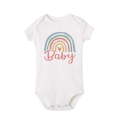 White baby onesie with a rainbow and 'Baby' text on a white background