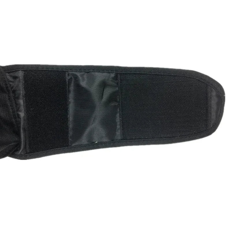 Black tactical glove on a white background