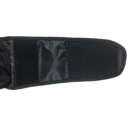 Black tactical glove on a white background