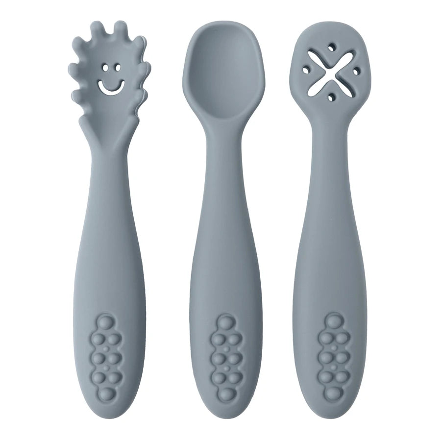 Three gray baby utensils with unique designs on a white background
