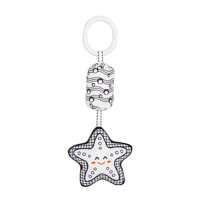 Star-shaped toy with a clip on a white background