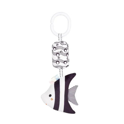 Black and white striped fish-shaped keychain on a white background