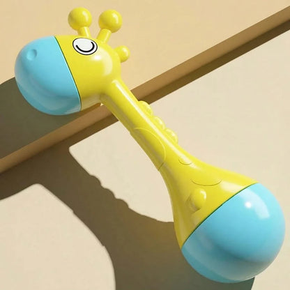 Yellow and blue toy with a giraffe design on a wooden surface