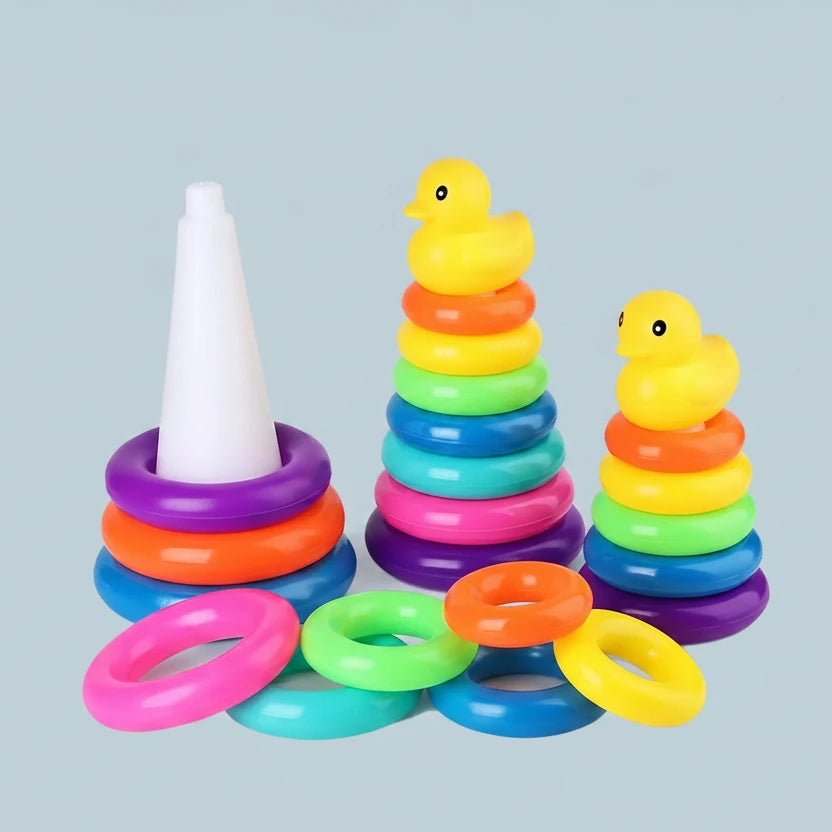 Colorful Rainbow Tower Jenga toy with rubber duck design on a light blue background