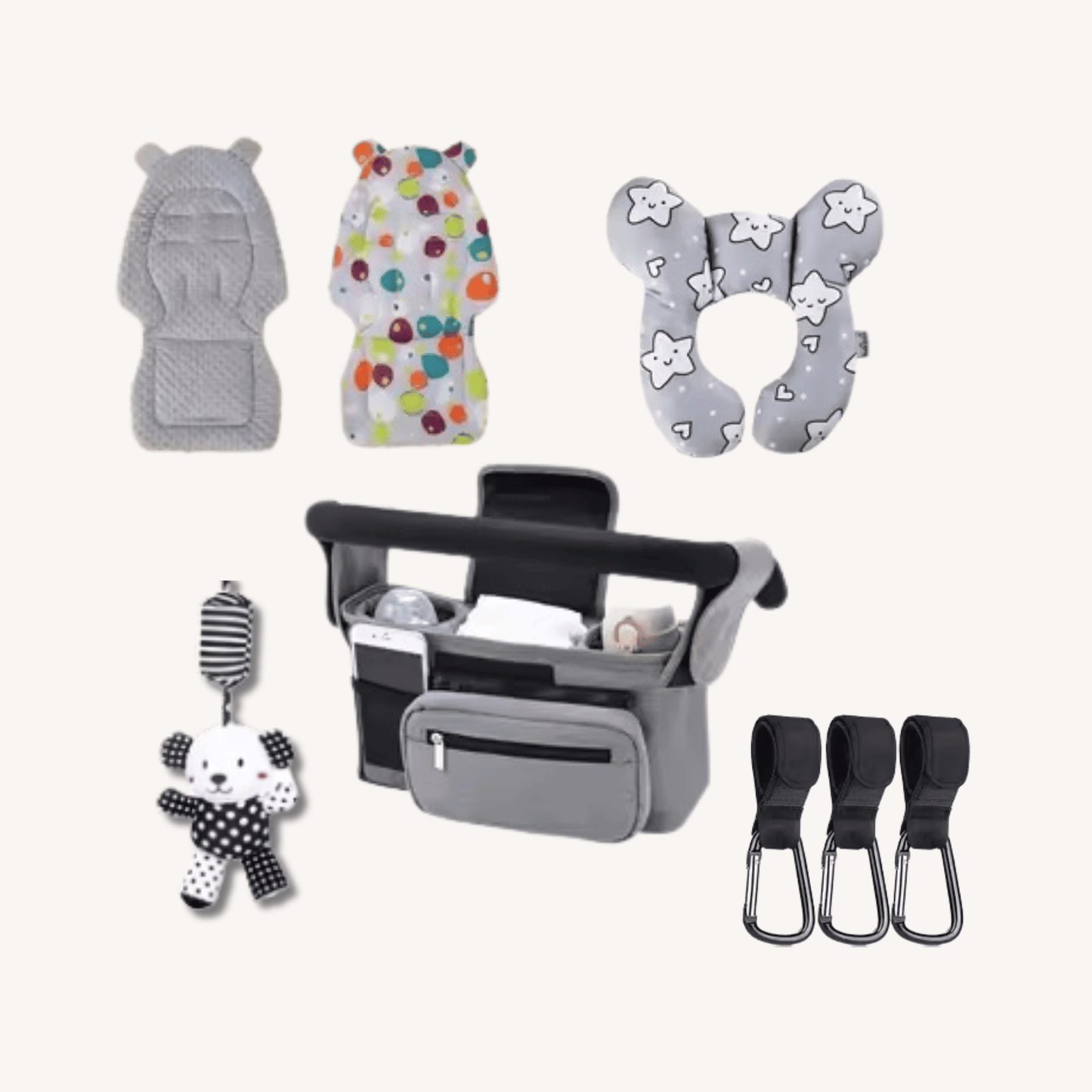 Collection of baby products including a carrier, car seat cover, and accessories on a white background